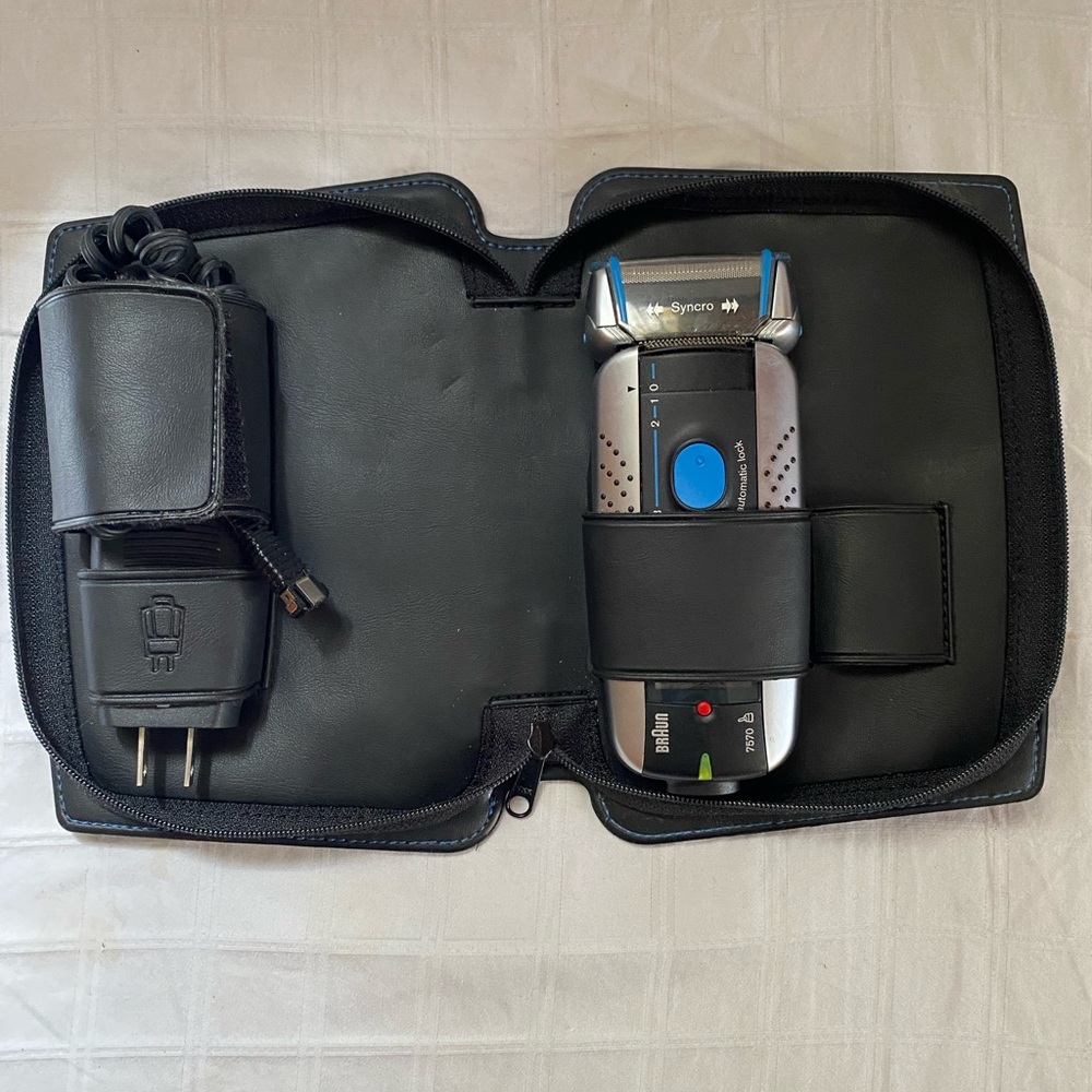 Braun Electric Shaver with Black and Blue Accents